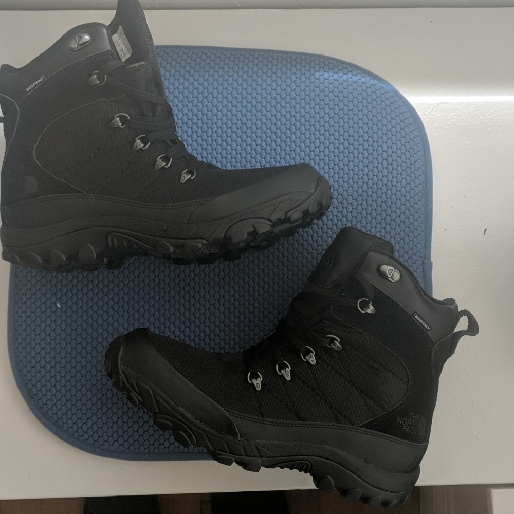 Never worn North Face waterproof boot